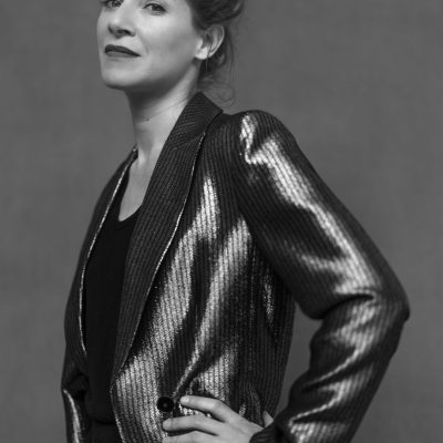 Portrait of Camille Merckx, opera singer, mezzo-alto, artistic director, taken in May 2025 in Montreuil, France.